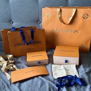 Louis Vuitton shopping bags and boxes
